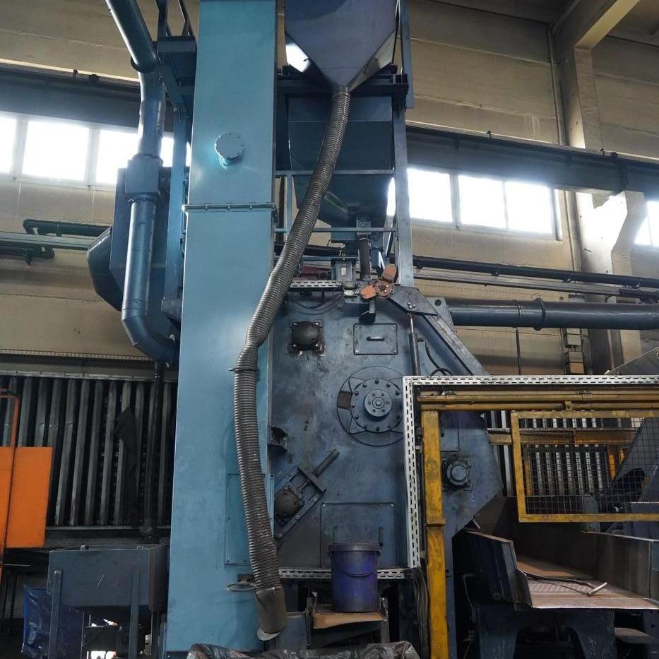 Troughed belt blasting machine